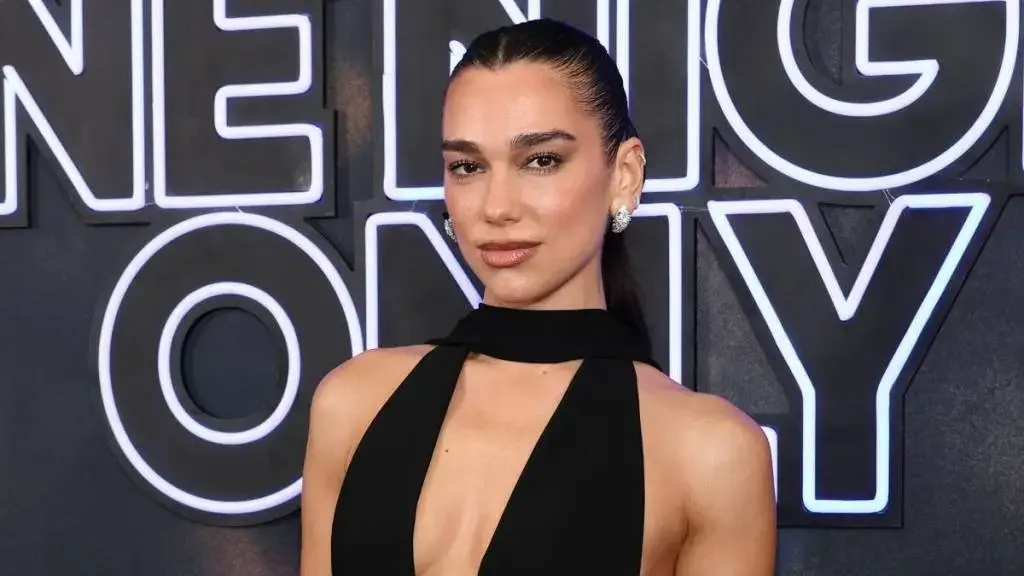 Dua Lipa Dazzles in Bold Premiere Attire