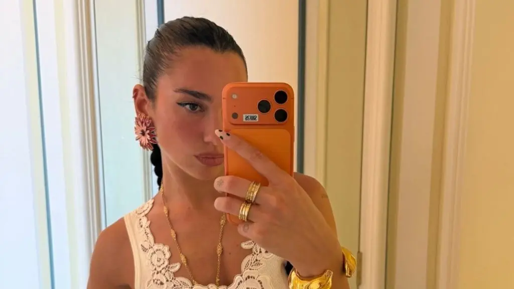 Dua Lipa Stuns Vogue Italia Cover With Lacy Bralette Under Cut‑Out Velvet Gown