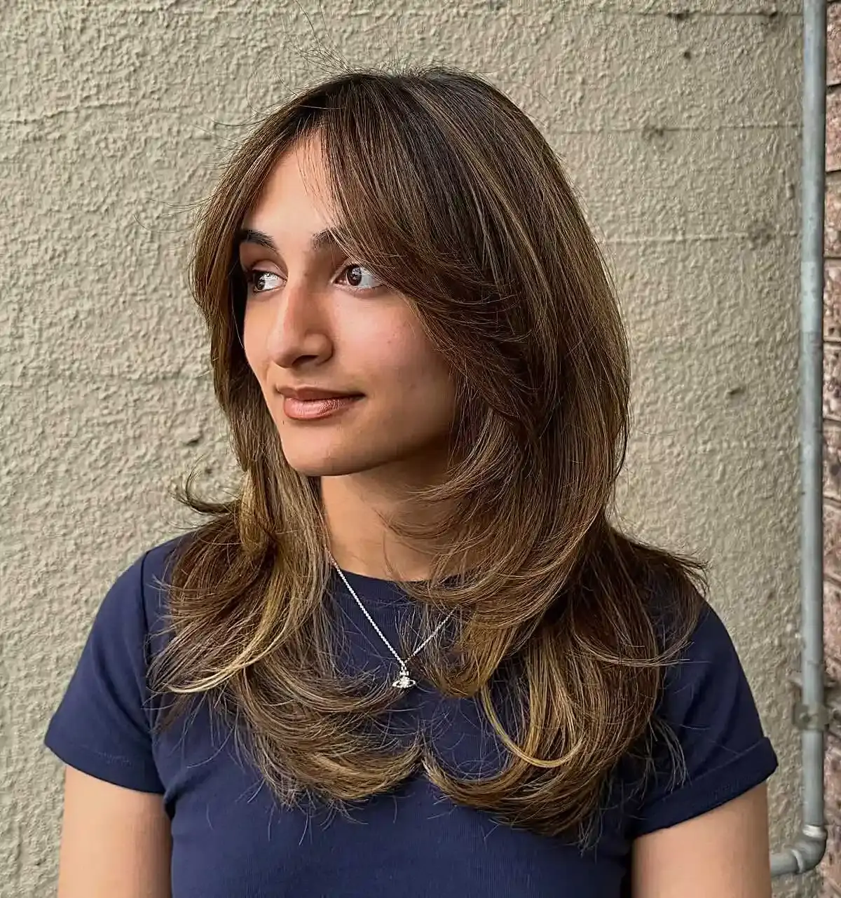 Feathered Layers Offer Volume for Fine Hair