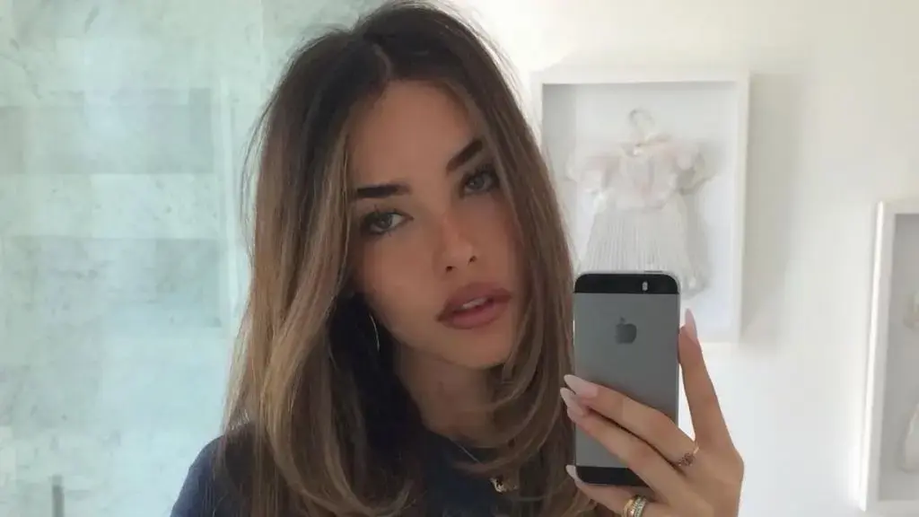Madison Beer Sizzles in Plunging Minidress