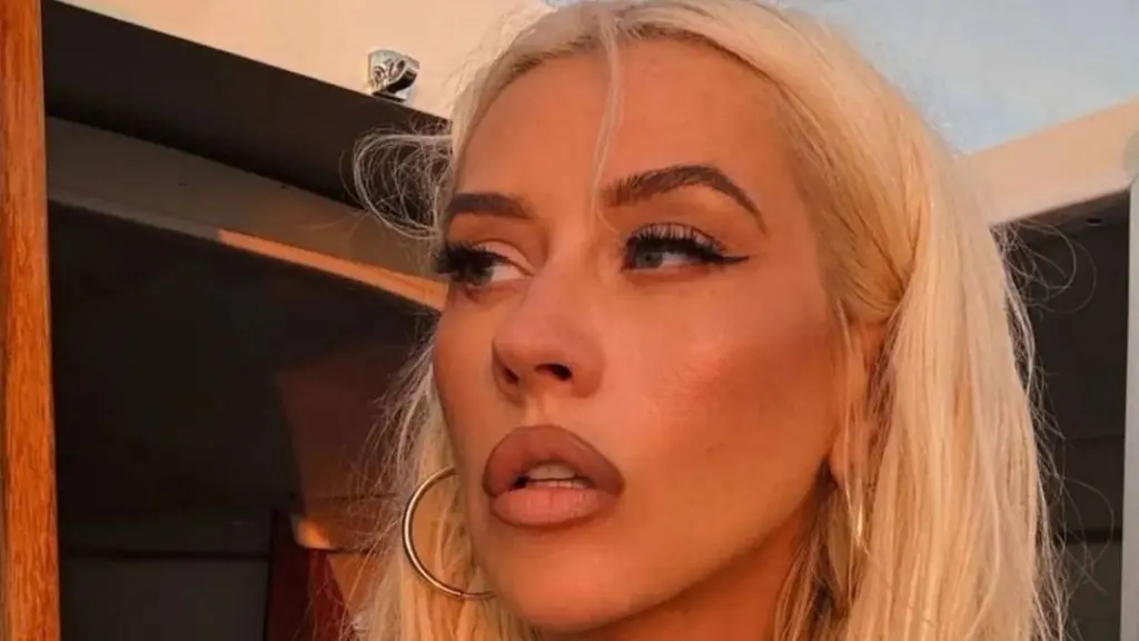 Christina Aguilera Stuns in Black Gown With Dramatic Thigh-High Slit