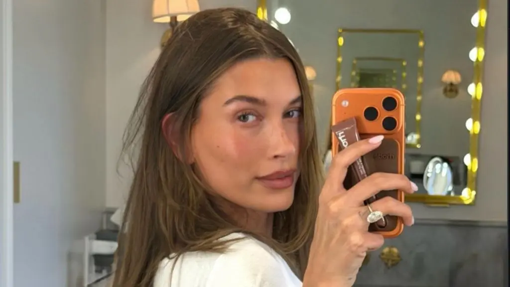 Hailey Bieber’s Plunging Cerruti Dress Gives Vintage Glamor a Sultry Twist