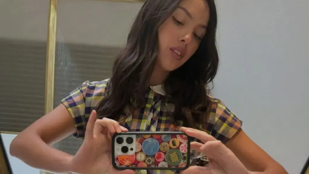 Olivia Rodrigo Stuns in Lace Micro Minidress at New Exhibition