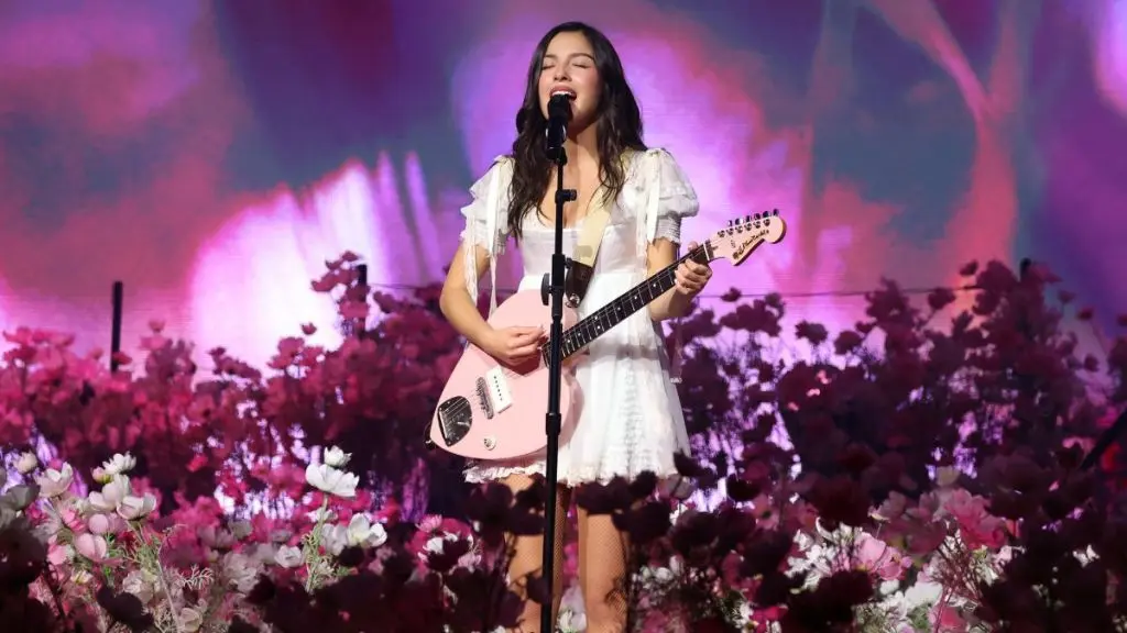 Olivia Rodrigo Debuts Melting Couture Dress on Tour