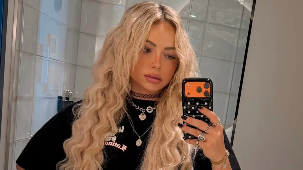 WWE's Liv Morgan Turns Up the Heat in Tiny Red Shorts That Look Like Underwear