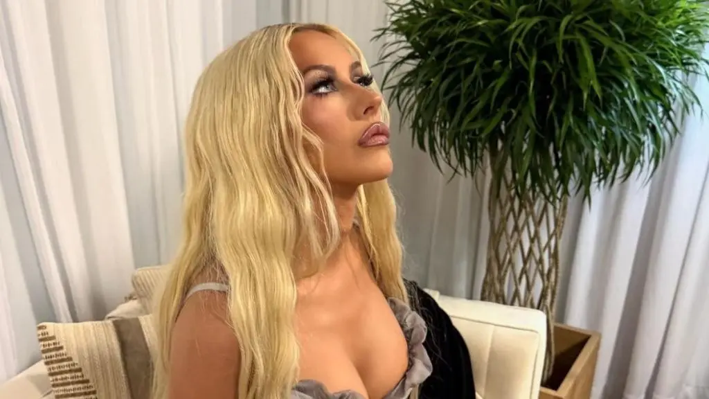 Christina Aguilera Stuns in Bold Lace Ensemble for Upcoming Project Reveal