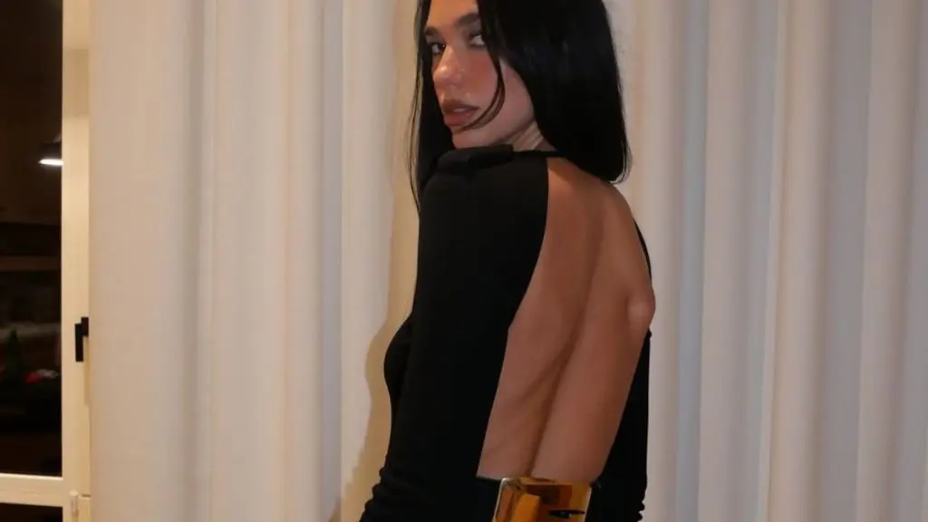 Dua Lipa Unveils Iconic Gucci Maxi with Dramatic Cutout at Recent Fashion Event