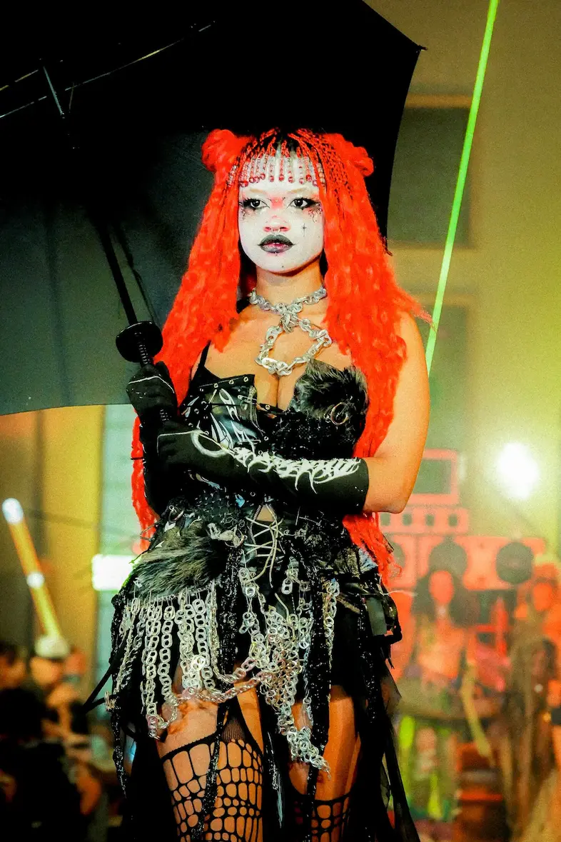 DYSTOPIC presents the Camuflagem Rastreada collection at an anti-fashion event in Brazil