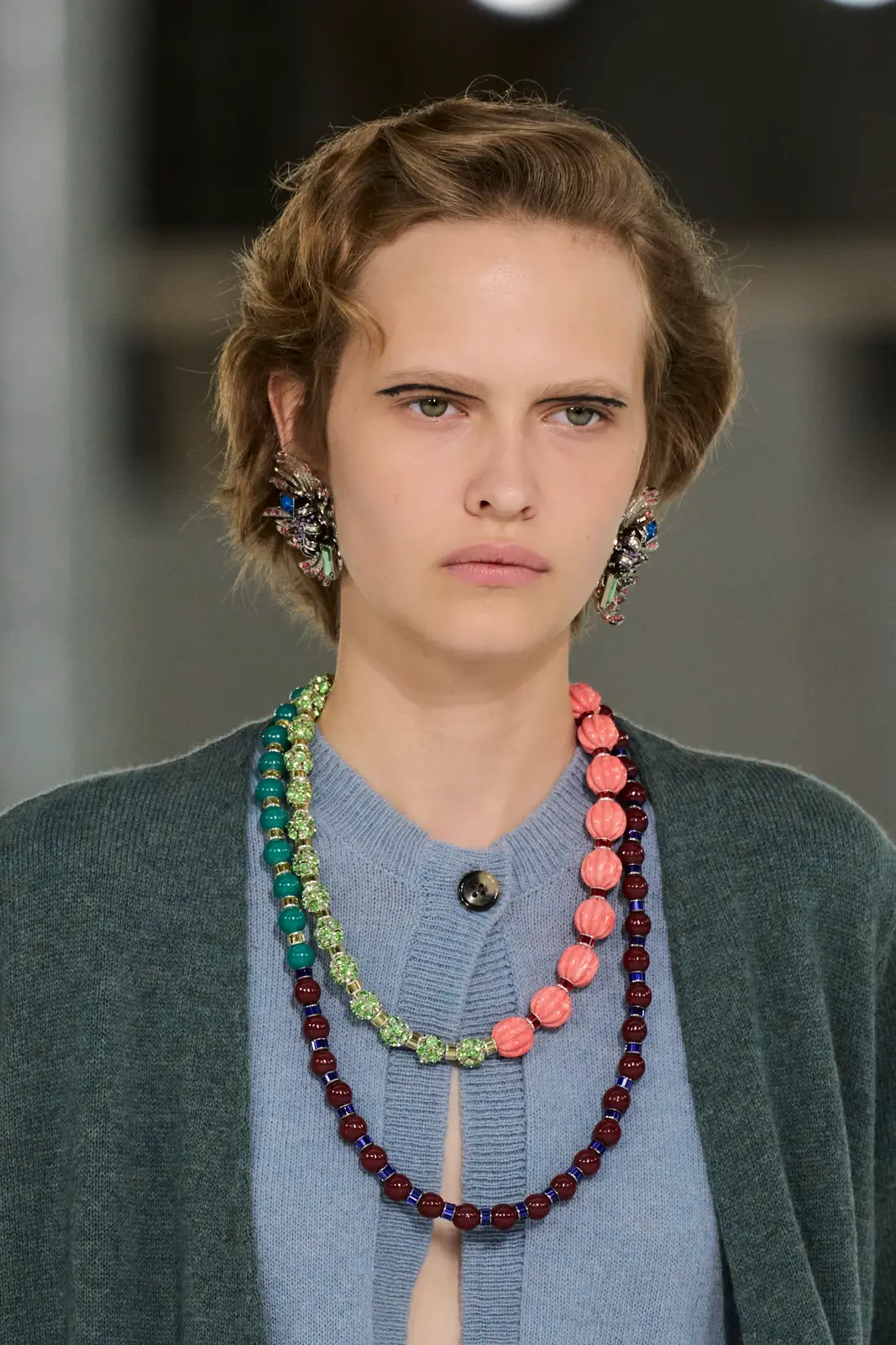 Paris Runway Beauty Trends Embrace Imperfection and Bold Color